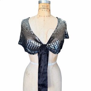 Marciano Cape Sleeves Black and Silver Sequin Fabric
One Size